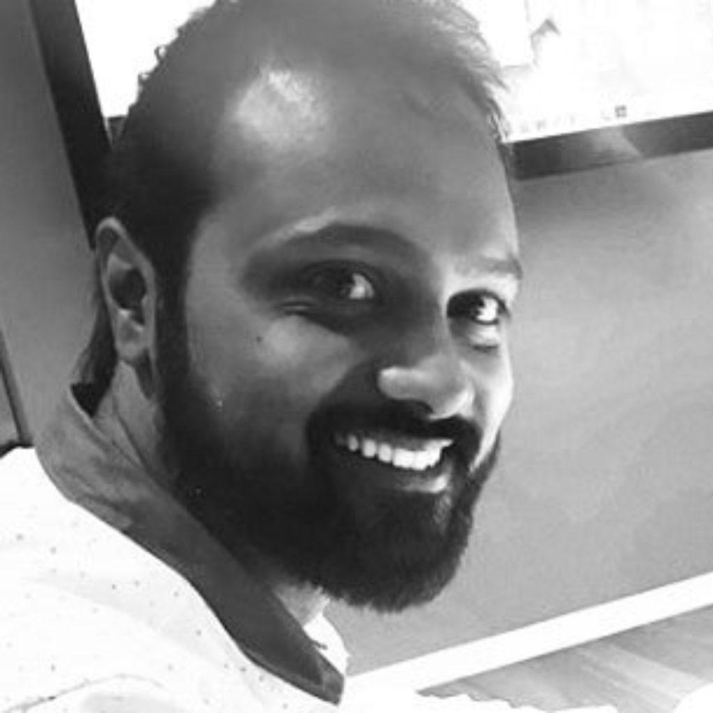 Portrait of Sashidhar Girigopal, Sales Advisor, smiling and representing client-focused sales expertise and relationship building