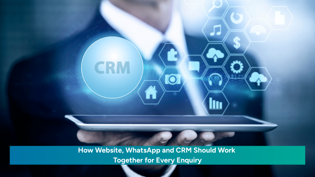 Businessman holding tablet with CRM, WhatsApp and website integration icons
