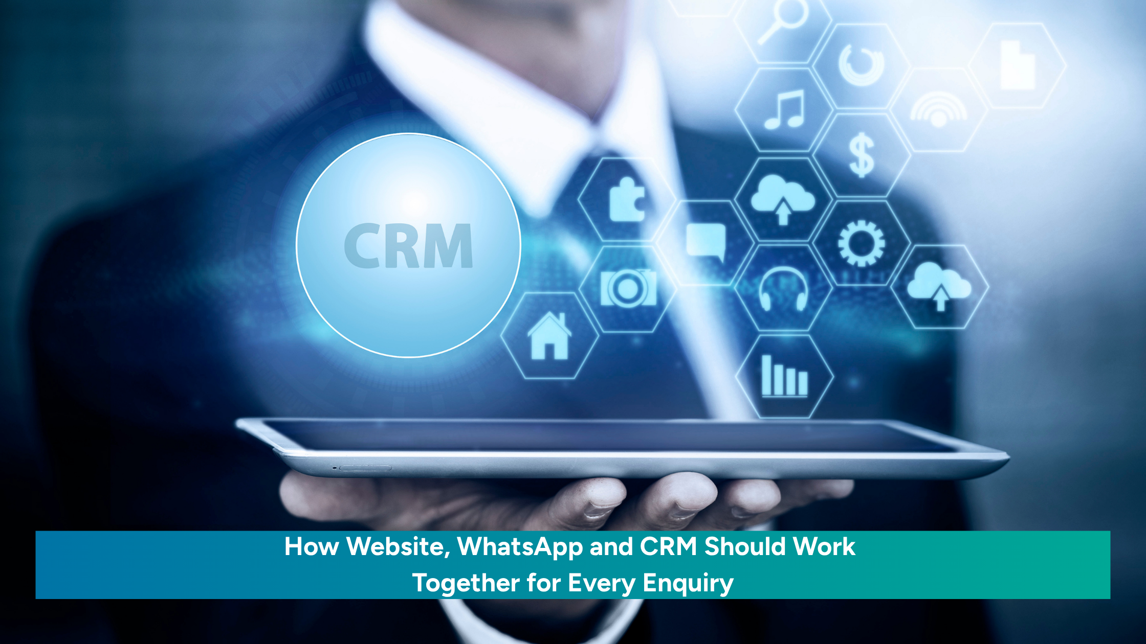 Businessman holding tablet with CRM, WhatsApp and website integration icons